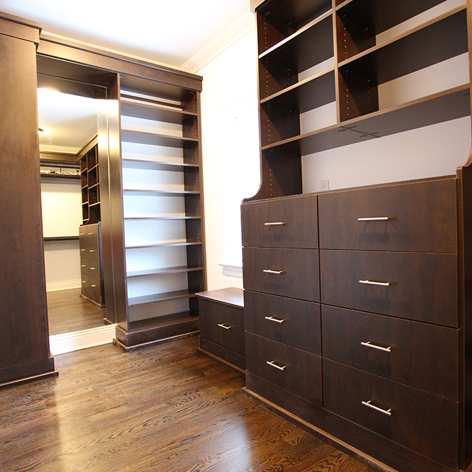 Modern Chocolate Pear Walk-In Closet-with-Dressing-Mirror, Window Seat-and-Mouldings-innovative-closet-design-