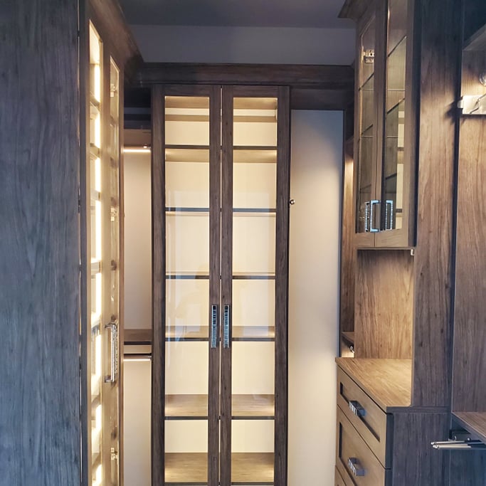 Shaker Style Walk-In Closet with Integrated-LED-Lighting-Mullion Doors-and-Crown-Moulding-Innovative-Closet-Solutions